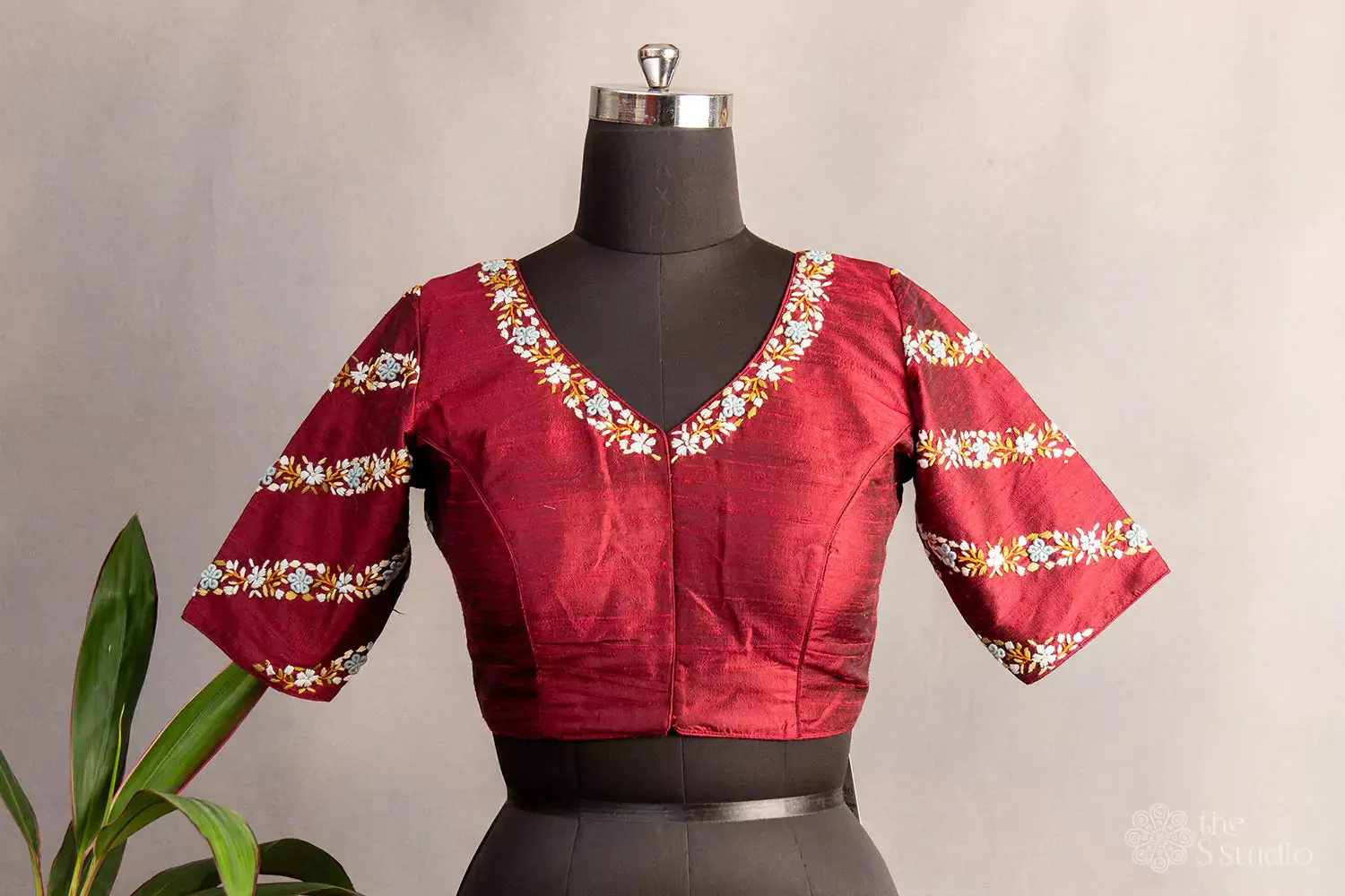 Maroon hand  embroidered raw silk blouse with rounded v neck pattern