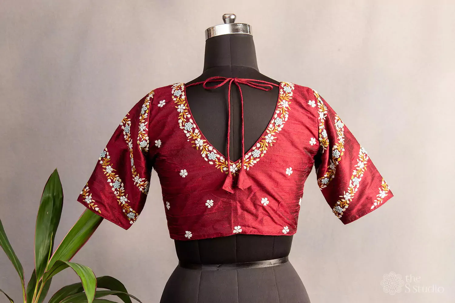 Maroon hand  embroidered raw silk blouse with rounded v neck pattern