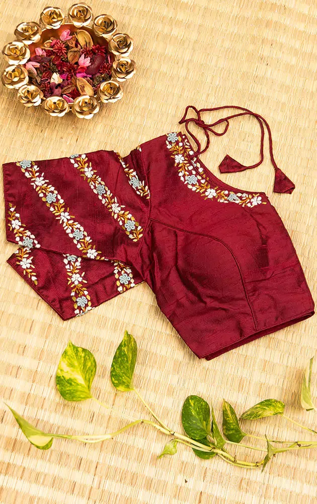 Maroon hand  embroidered raw silk blouse with rounded v neck pattern